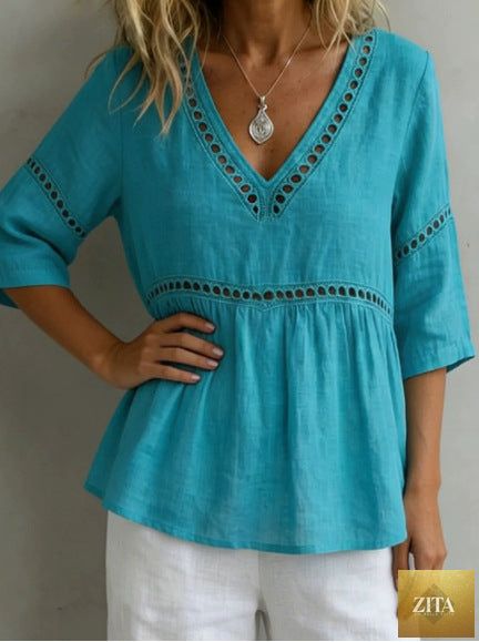 Women's V-neck hollow-out fringe cotton-linen casual top by Zita La Belle Elite, showcasing a stylish V-neck and fringe details.