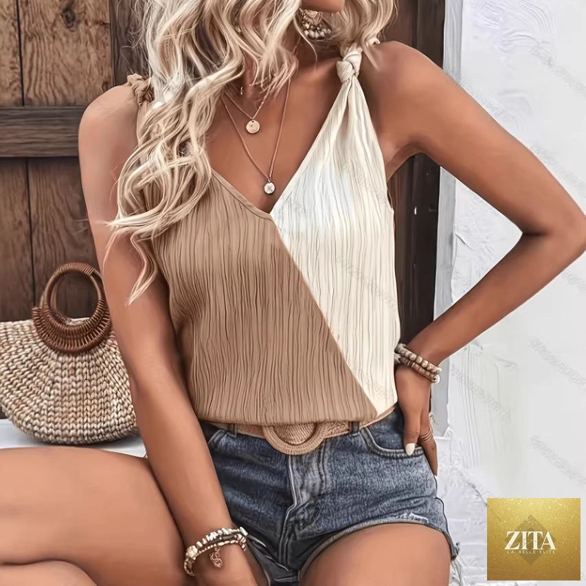 Women's solid V-neck sleeveless camisole top by Zita La Belle Elite, showing a smooth, fitted fabric in a close-up view.