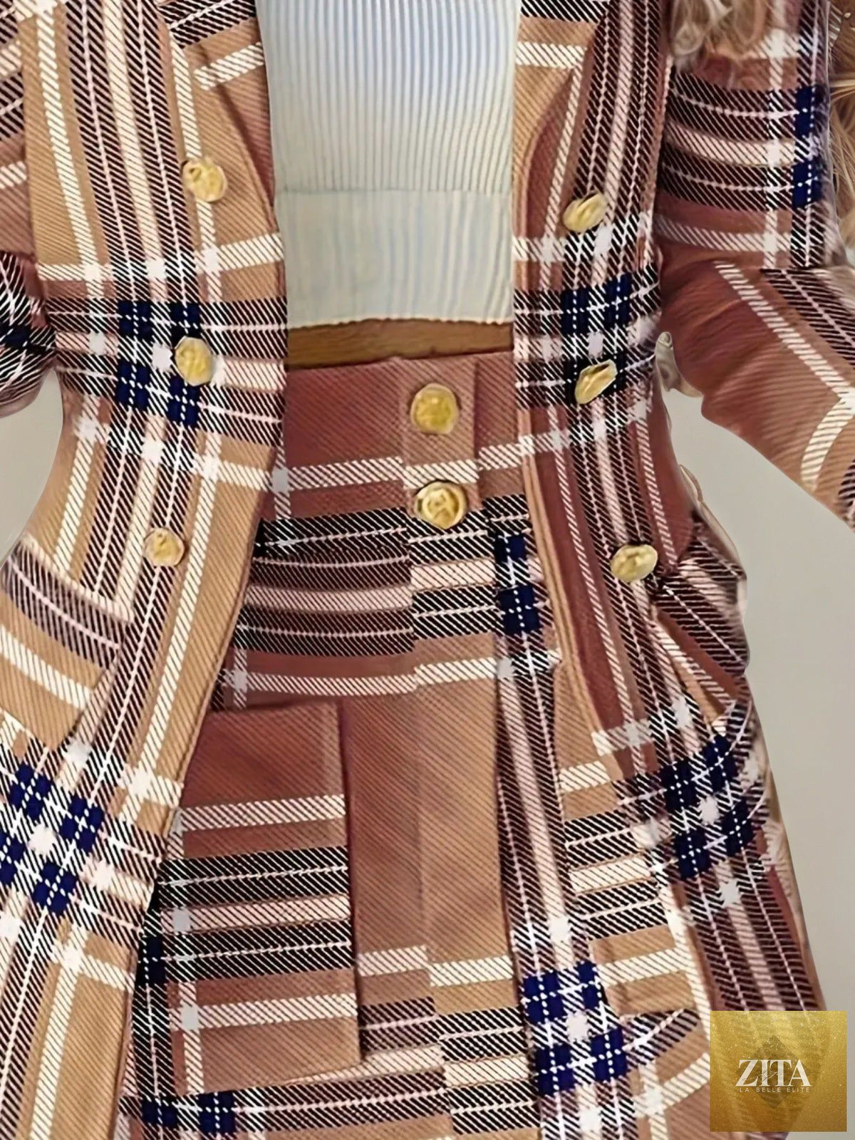 Women’s elegant plaid skirt suit set by FitiqueFit, featuring a stylish blazer and matching skirt for casualwear.