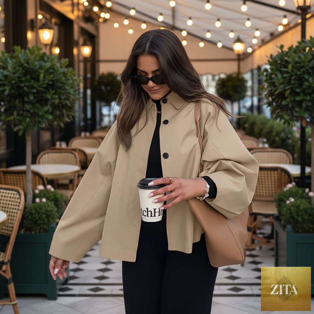Women's French-style loose mid-length trench coat by FitiqueFit, featuring classic design and workwear chic style, shown on model.