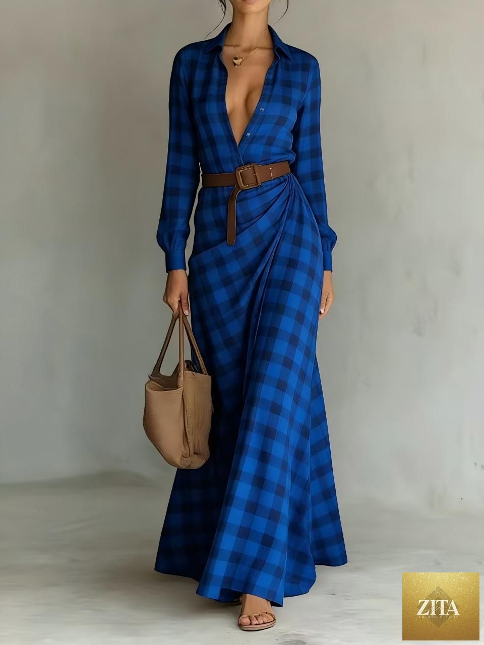 Women's belted irregular pleated dress by FitiqueFit, featuring a flowy silhouette and stylish design, shown on a model.