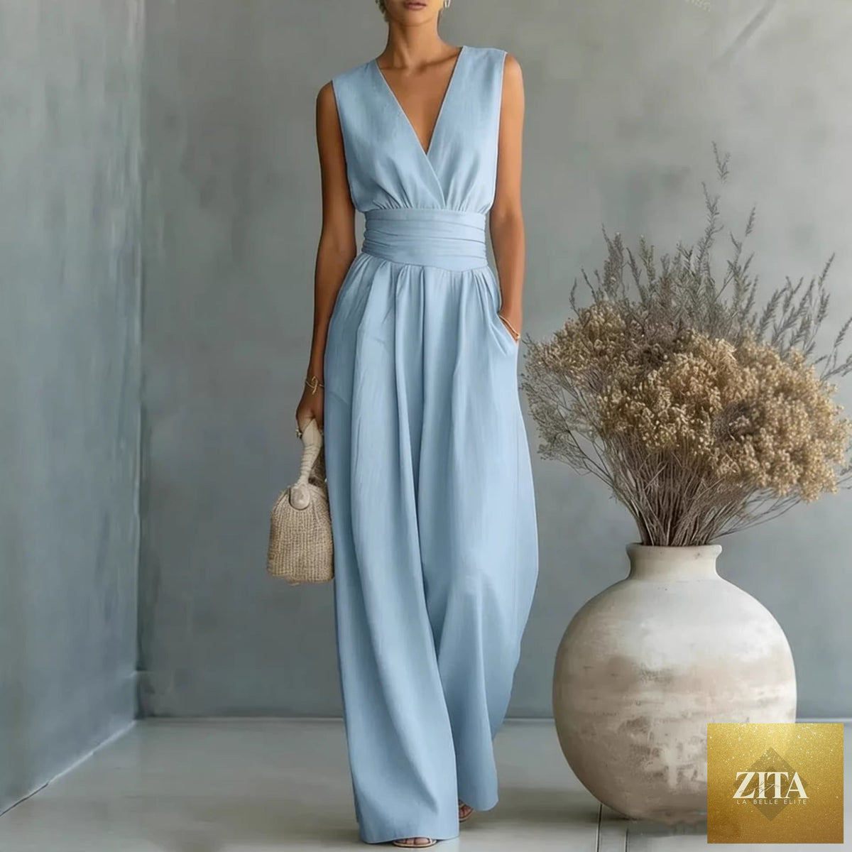 Women's elegant V-neck sleeveless jumpsuit by Zita La Belle Elite, featuring a fitted waist and straight-leg casual style.