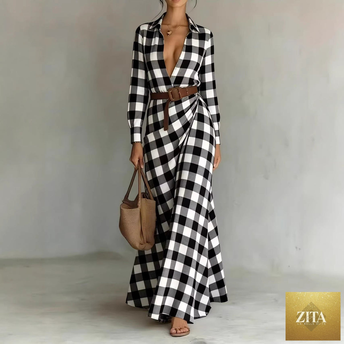 Women's belted irregular pleated dress by FitiqueFit, featuring a flowing silhouette and stylish design in the image.
