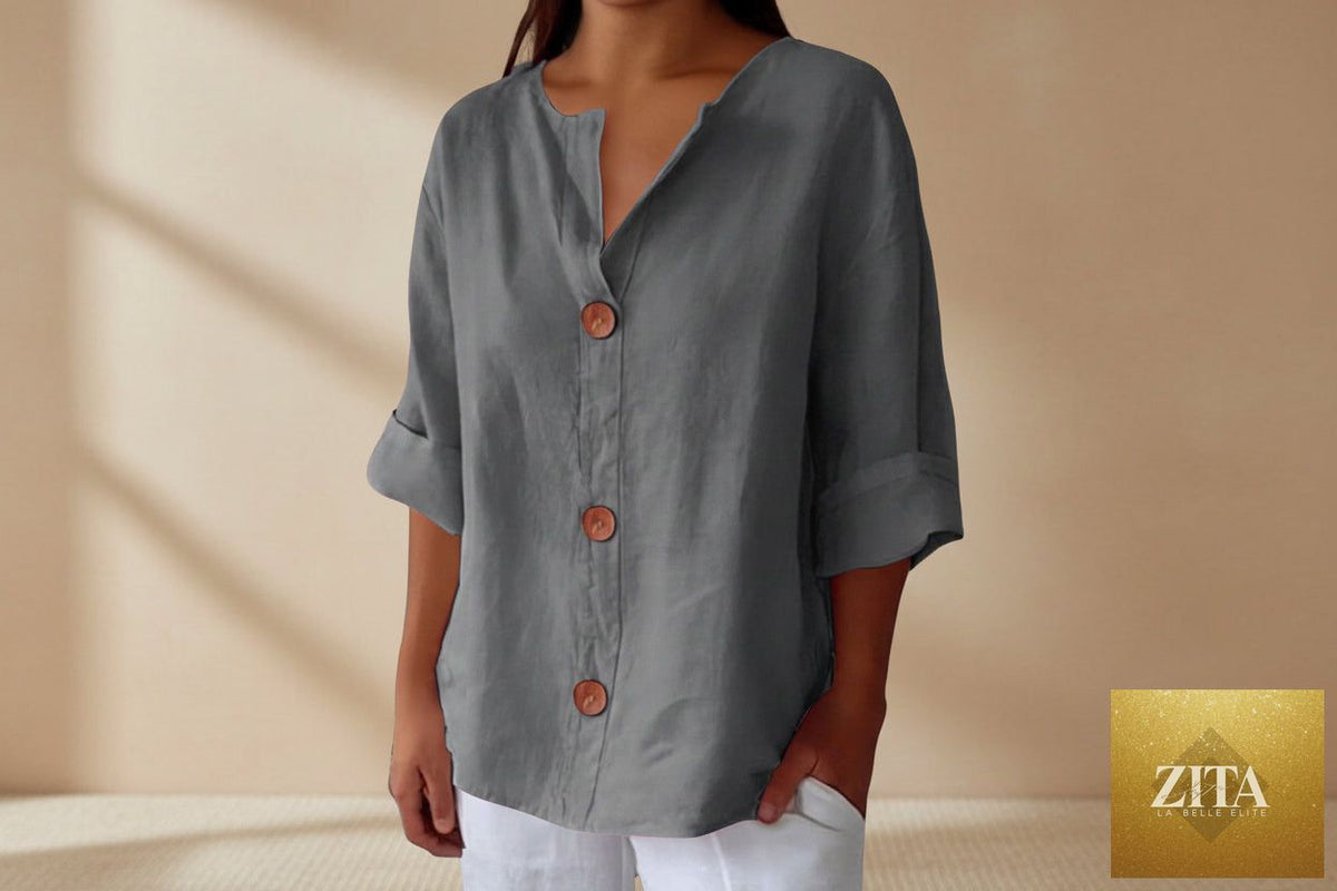 Women's V-neck cotton linen casual blouse with button details by FitiqueFit, featuring a relaxed fit and lightweight fabric.