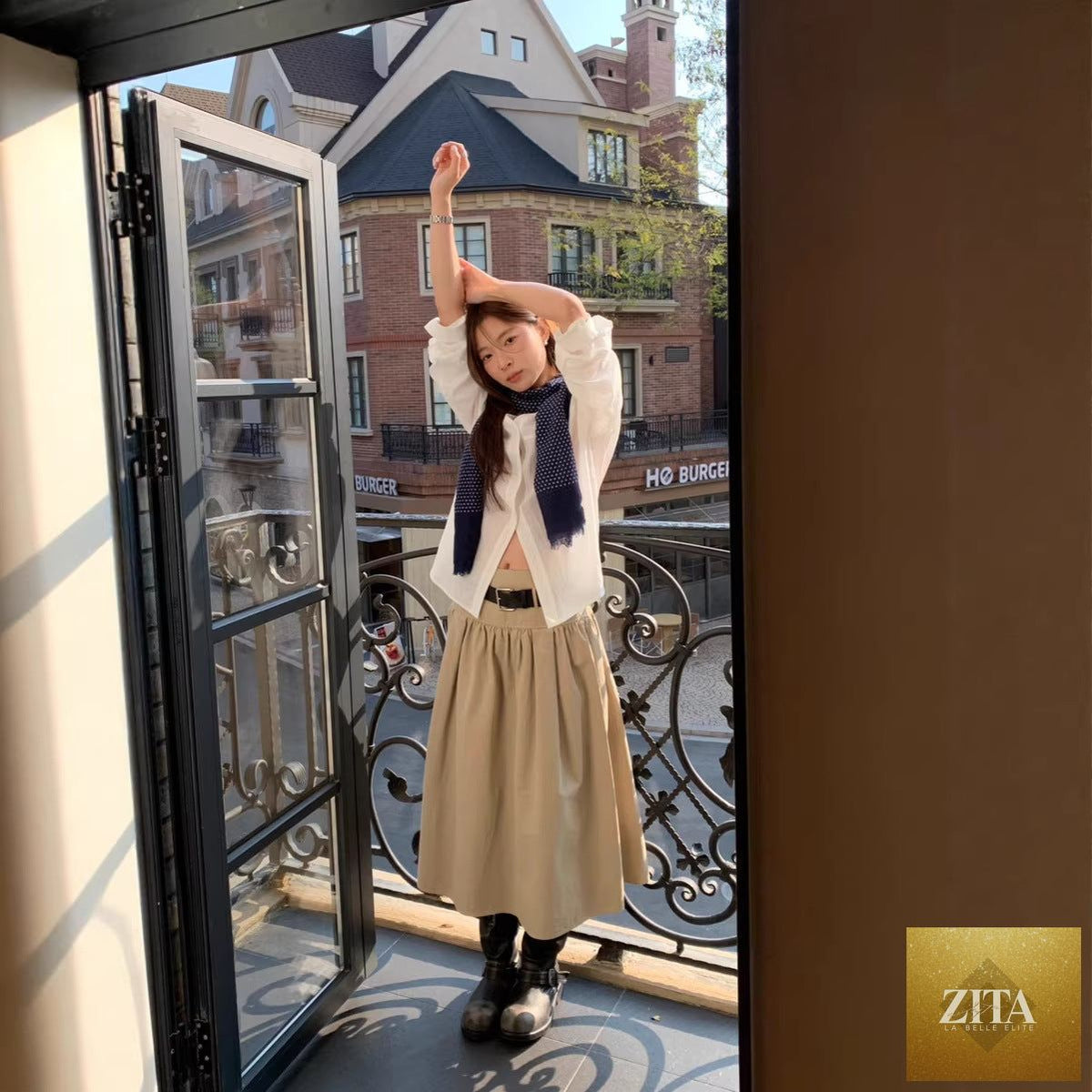 Zita La Belle Elite casual cotton midi skirt with relaxed A-line fit, crushed pleats, and belt for a stylish, comfortable look.