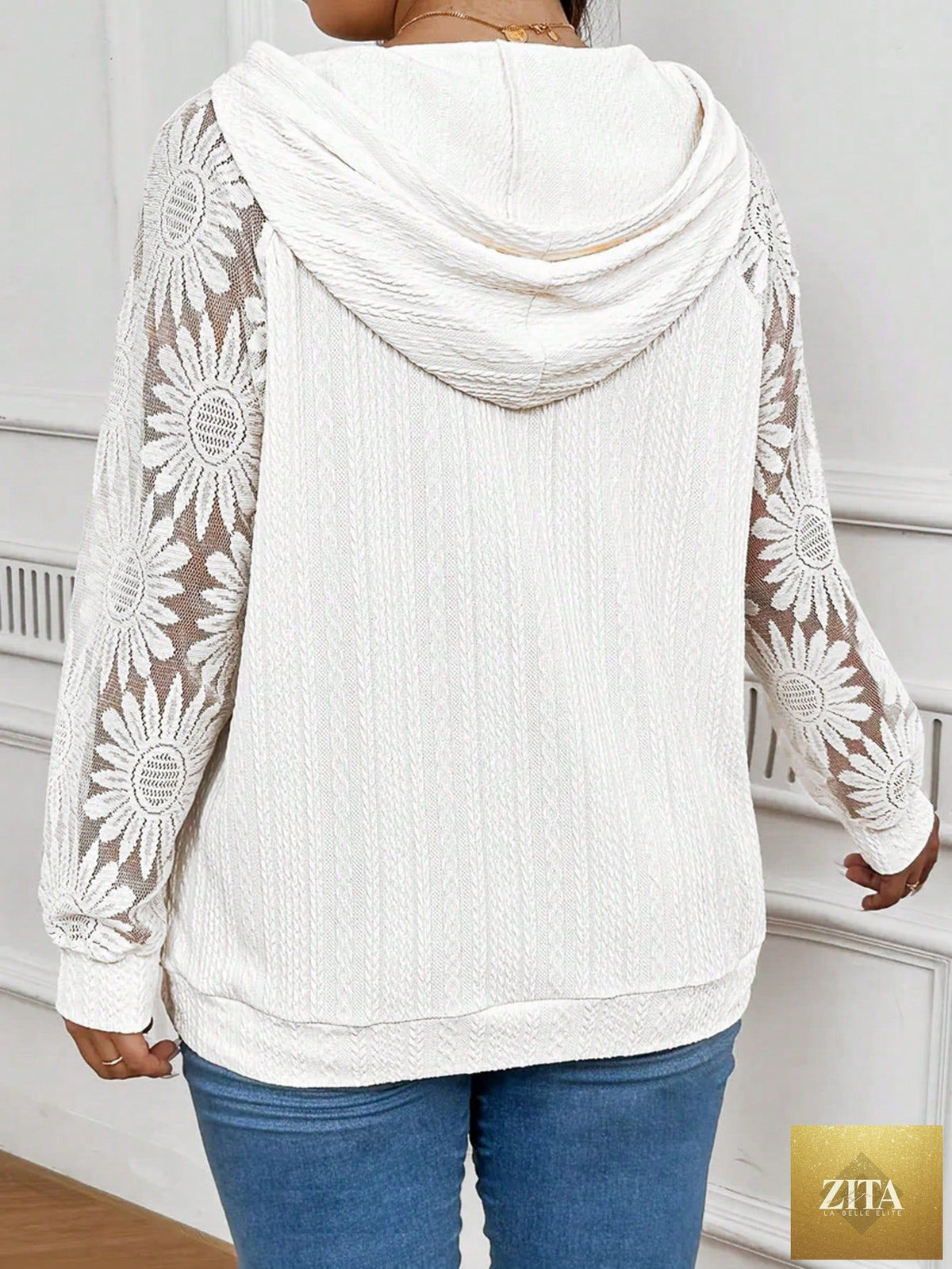 White women's long sleeve hoodie by Zita La Belle Elite with round neck, hollow-out lace paneling, and pullover design.