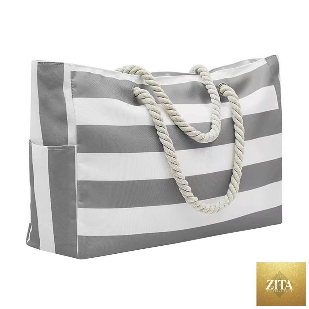 Embroidered striped beach bag with large capacity from Social Buzz eSIMs, showcasing colorful embroidery and spacious interior for beach essentials.