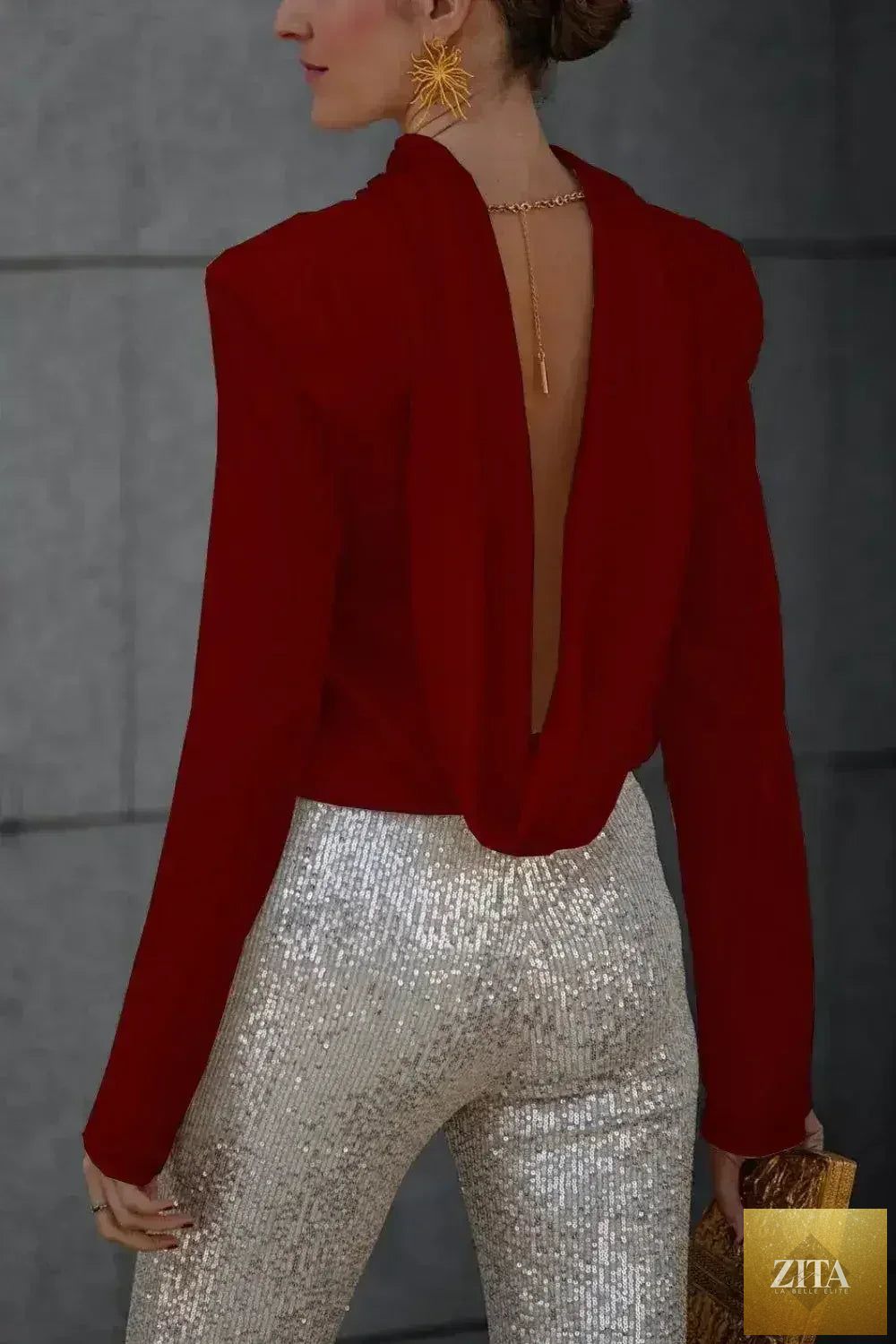 Femstylo women's backless cowl neck long sleeve blouse featuring a stylish, elegant design with flowing fabric and a fitted silhouette.