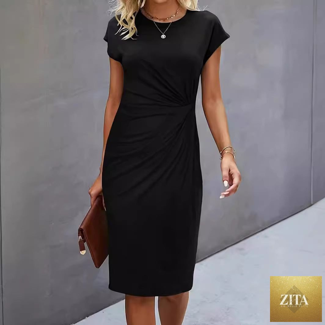 FitiqueFit front knot bodycon midi dress with round neck, sleeveless design and tie waist detail, shown on a model.