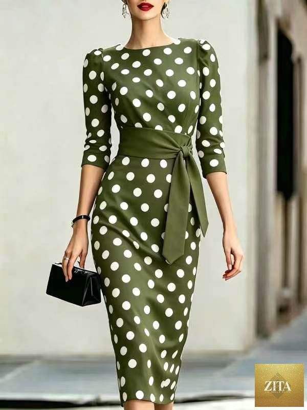 Women's retro polka-dot bodycon midi dress with belt and cross-tie detail, casualwear from Zita La Belle Elite.