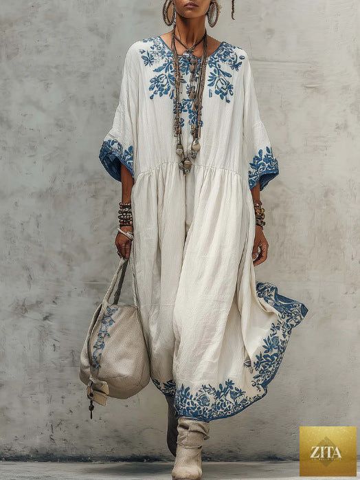 Women's printed batwing sleeve midi dress by Zita La Belle Elite, loose fit linen blend with colorful floral pattern.