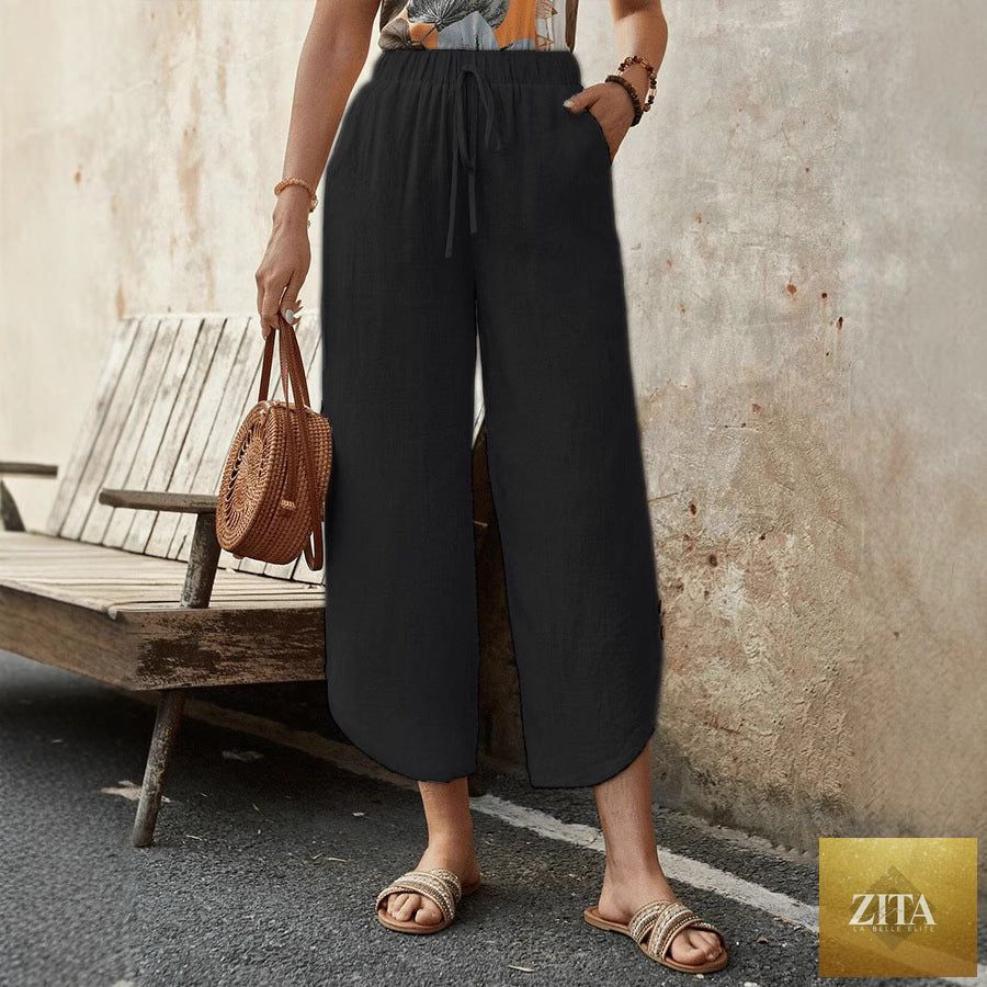 Women's cotton-linen cropped drawstring pants by FitiqueFit, casualwear with a relaxed fit and comfortable drawstring waistband.