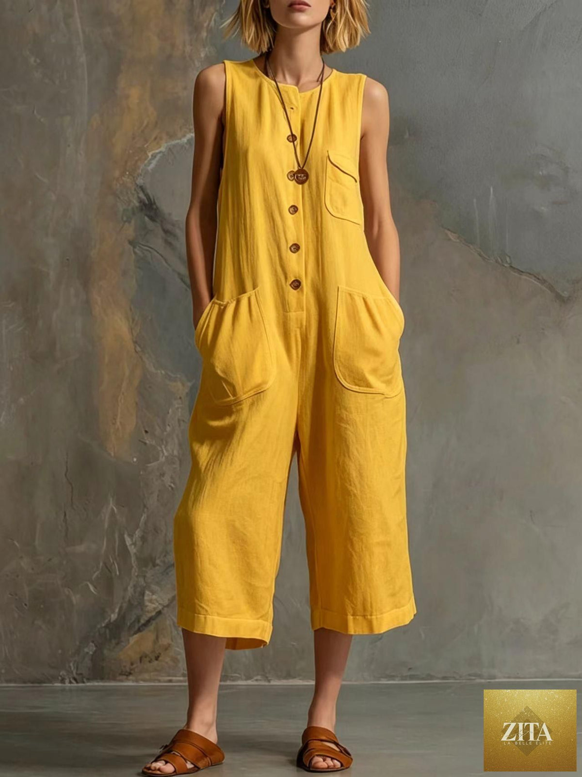 Retro sleeveless cotton-linen wide-leg cropped jumpsuit with a relaxed fit, featuring a stylish and breathable summer design.