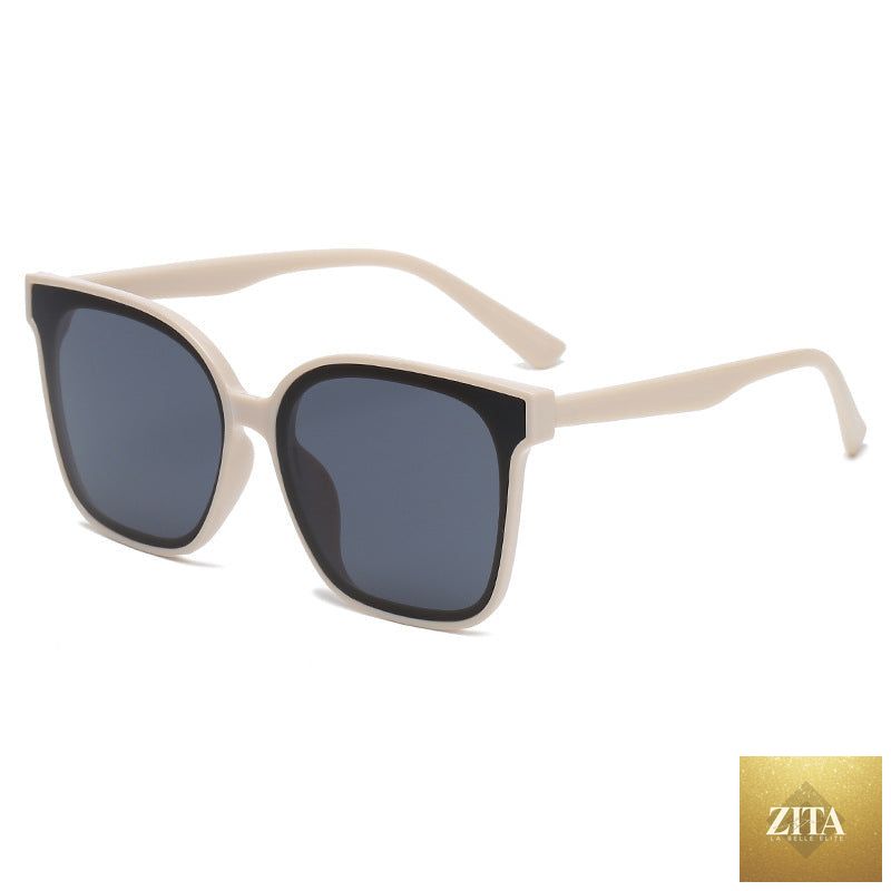 Retro INS Style sunglasses by FitiqueFit, simple everyday fashion shades with rounded frames and dark tinted lenses.