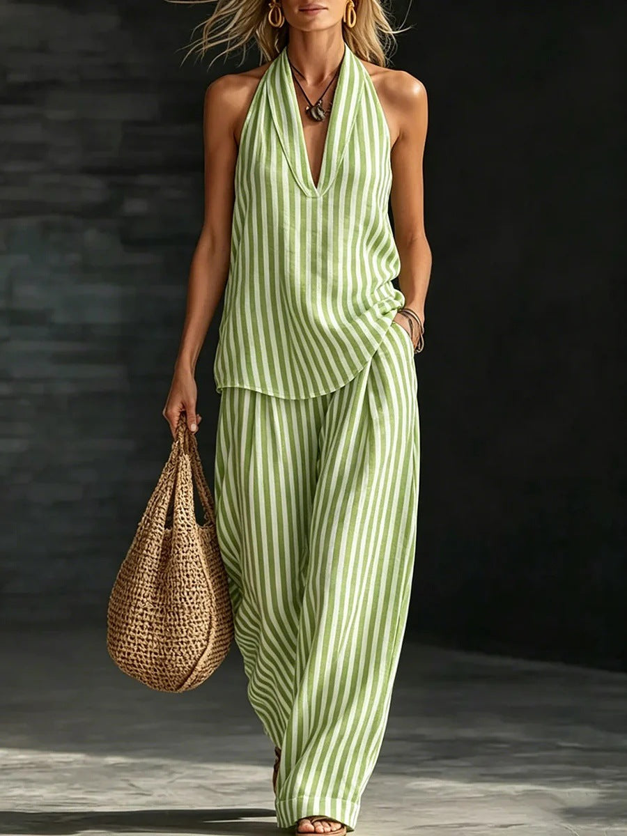 Women's striped sleeveless top and wide-leg pants set by FitiqueFit, casualwear two-piece outfit with a stylish, relaxed fit.