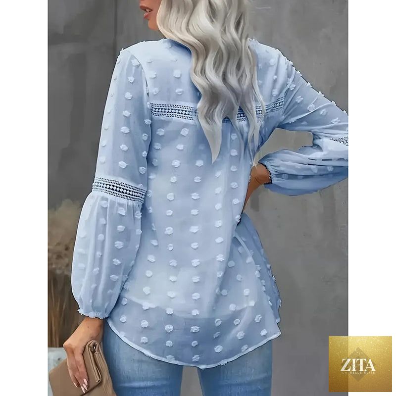 Women's long-sleeve V-neck business casual blouse by FitiqueFit, shown in a neutral color, styled for professional or casual wear.