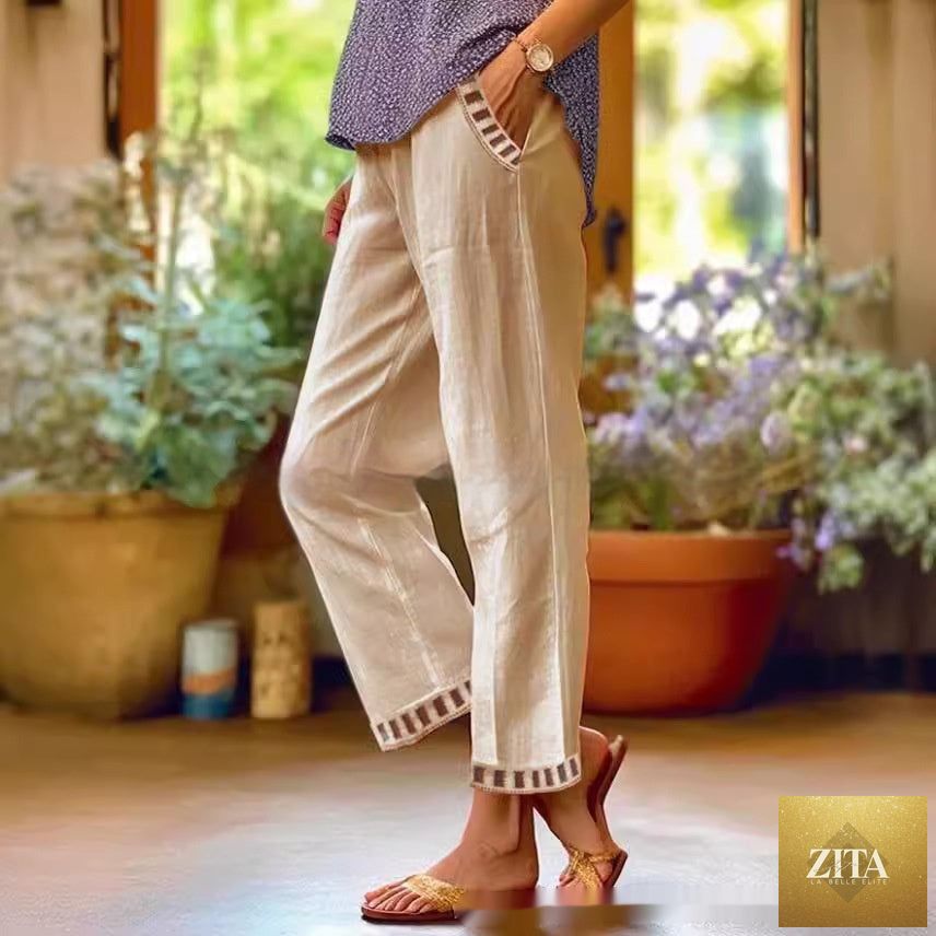 Women’s straight leg casual pants by Zita La Belle Elite, shown in a relaxed fit with fabric details and neutral color.