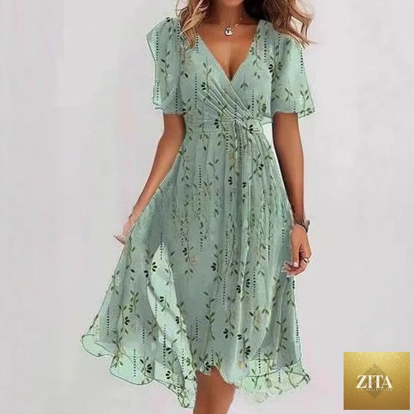 Floral print FitiqueFit A-line dress with V-neck, short sleeves, midi length, featuring colorful flower patterns on fabric.