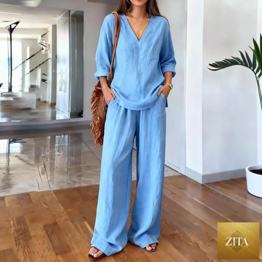 FitiqueFit long sleeve top and full-length pants two-piece set in 9 colors, available in sizes S to 3XL, shown in a stylish outfit.
