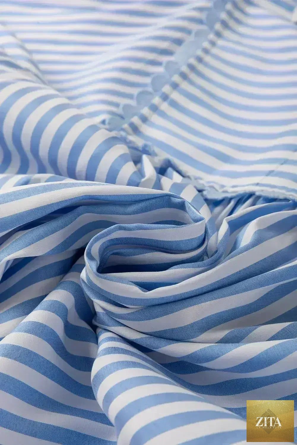 Sky blue striped Ric Rac trim collared V-neck blouse by Femstylo, featuring a stylish design and lightweight fabric.