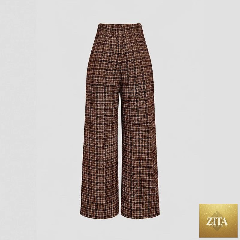 High-waisted plaid and striped retro pants by The Fashion Celestial, perfect for spring and summer commuter style.