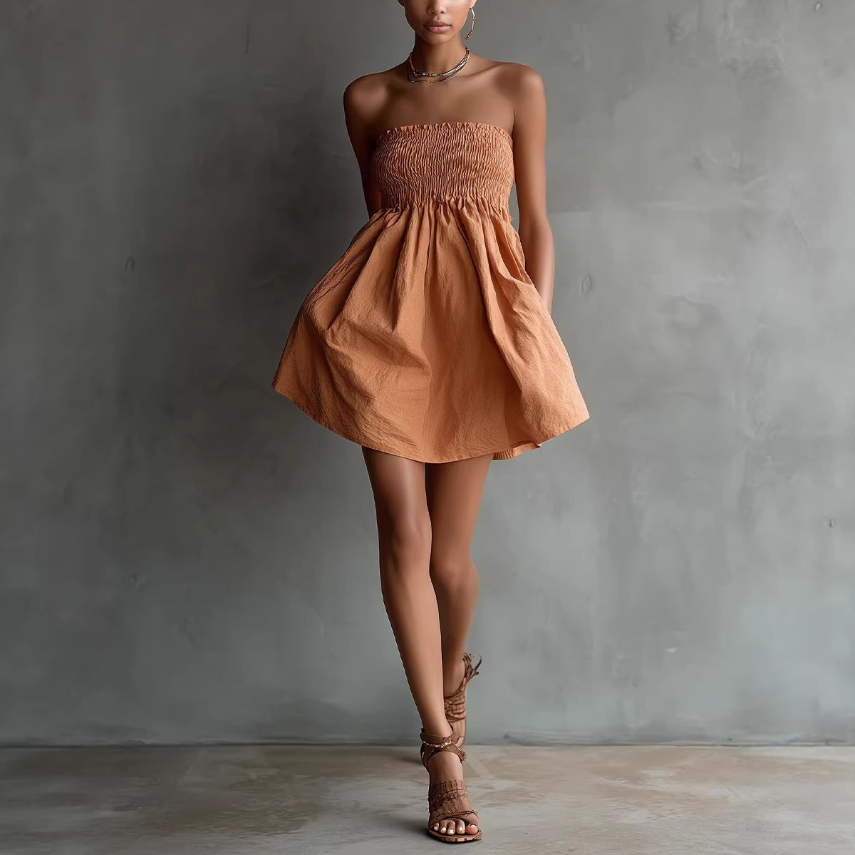Women's strapless tube mini dress by FitiqueFit featuring a solid color design and elastic waist for casualwear.