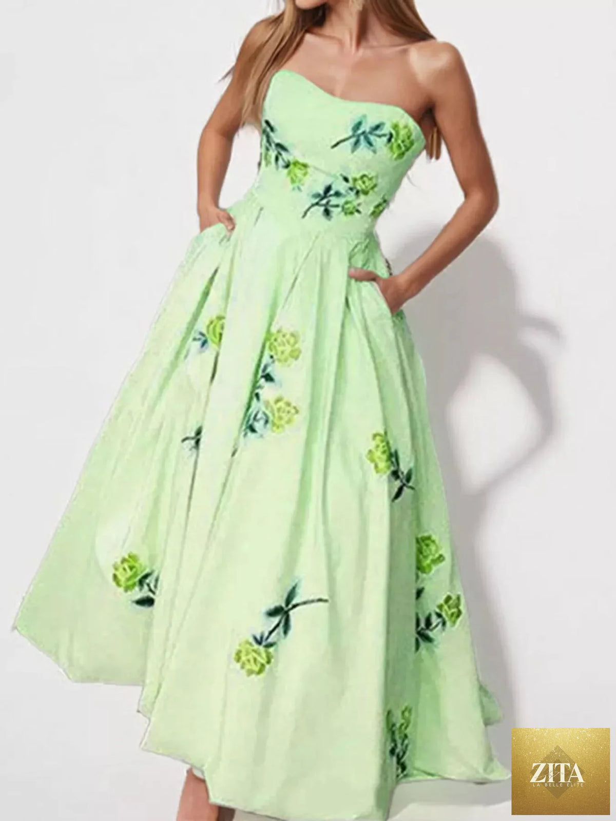Floral print tube maxi dress by Shopiebay featuring vibrant colors and a fitted bodice, flowing maxi skirt, perfect for summer wear.