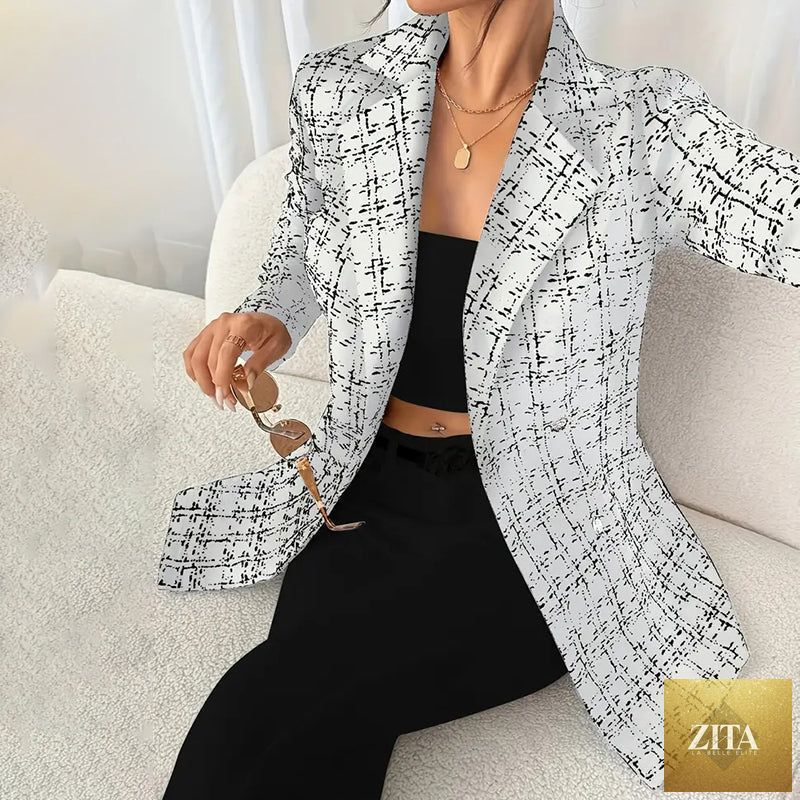 Women's plaid double-breasted blazer from FitiqueFit, featuring a tailored fit and classic design, shown on a model.