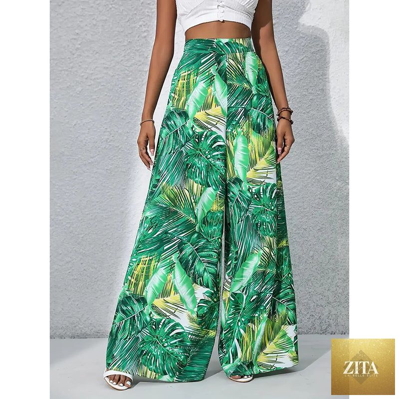 Women’s printed high-waist wide-leg palazzo pants by FitiqueFit, casualwear with bold floral pattern and flowing wide-leg design.