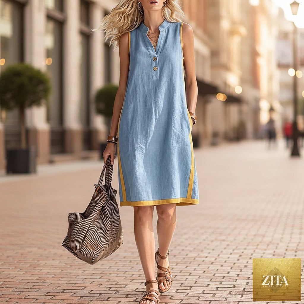 Women's sleeveless V-neck button-front A-line midi dress with pockets, casualwear by FitiqueFit, shown in a light fabric.