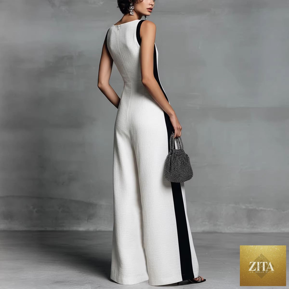 Women's sleeveless V-neck contrast color wide-leg jumpsuit by Zita La Belle Elite, displayed with a relaxed casualwear style.