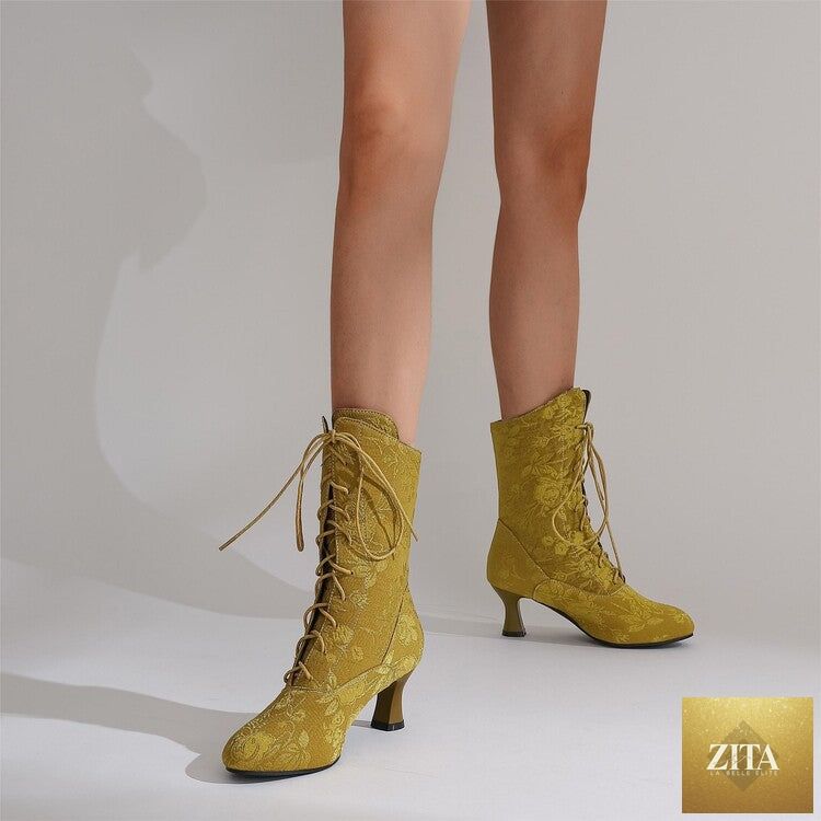 Women’s pointed-toe kitten-heel boots by Zita La Belle Elite, stylish autumn winter footwear, black leather with sleek design.