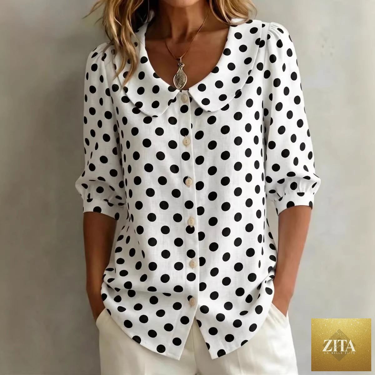 Women's retro polka dot three-quarter sleeve loose cardigan from Zita La Belle Elite, casualwear with a relaxed fit and vintage style.
