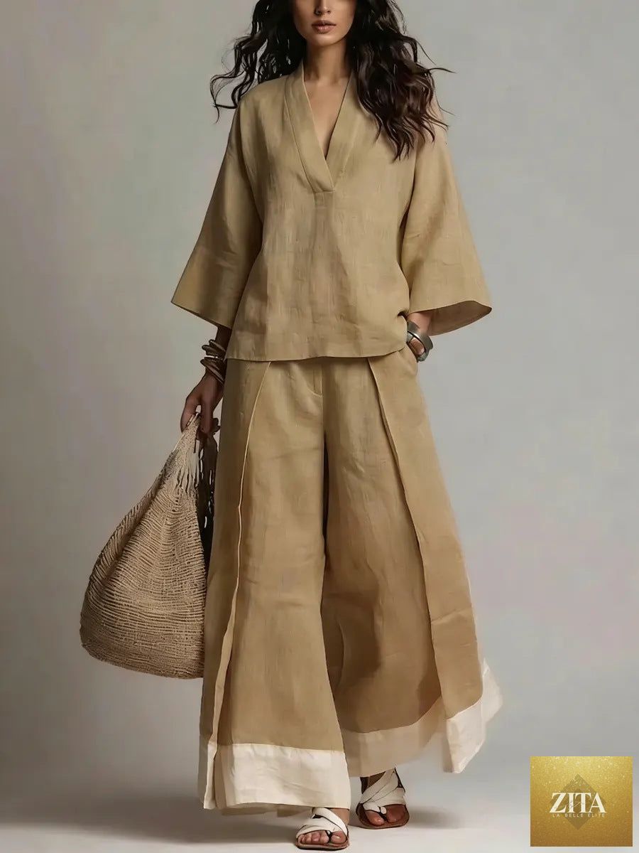 Women's cotton-linen V-neck 3/4 sleeve shirt and wide-leg pants set by FitiqueFit, shown in a relaxed, stylish outfit.