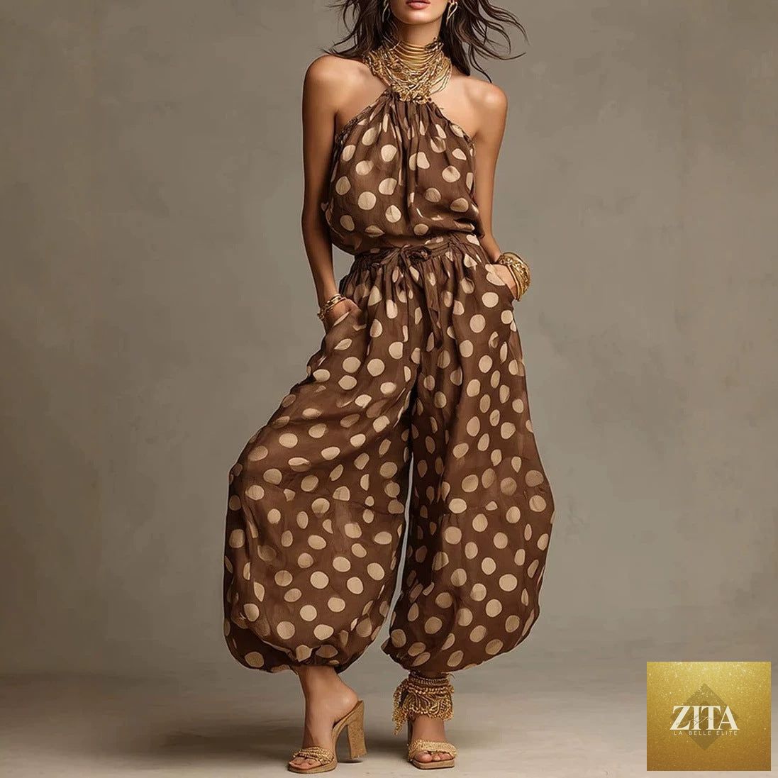 Women's polka dot halter neck wide-leg jumpsuit by FitiqueFit, featuring a boho style perfect for beach vacations.
