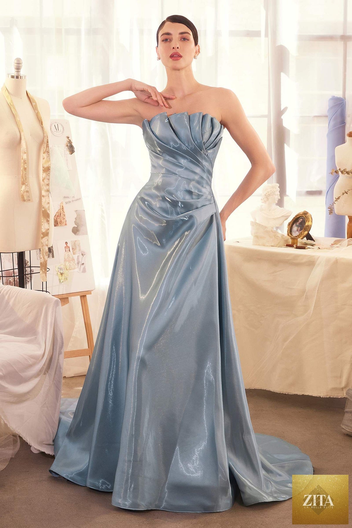 Andrea & Leo A1439 pleated liquid taffeta gown in smoky blue, front view showing elegant origami-inspired design.