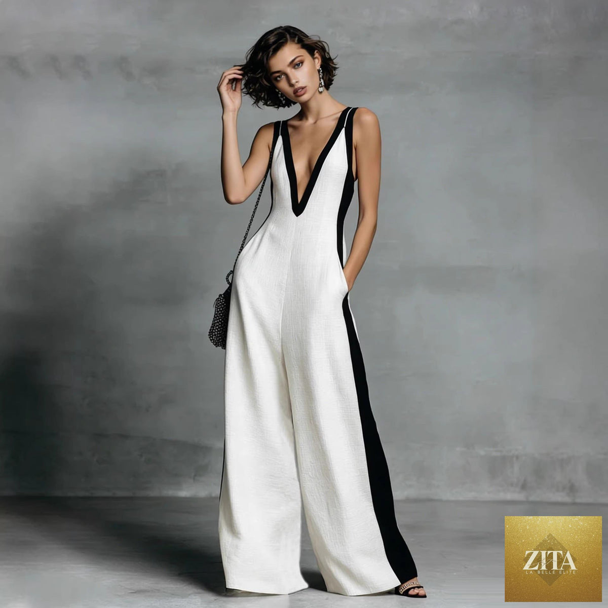 Women's color-block sleeveless V-neck wide-leg jumpsuit by FitiqueFit, featuring long casual pants in a stylish French-inspired design.
