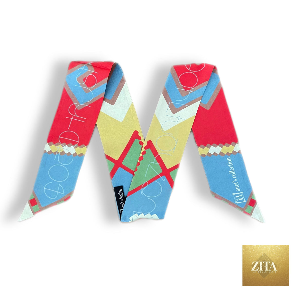 Armenian alphabet and rug design scarf from Anet's Collection LLC featuring colorful woven patterns and decorative tassels.