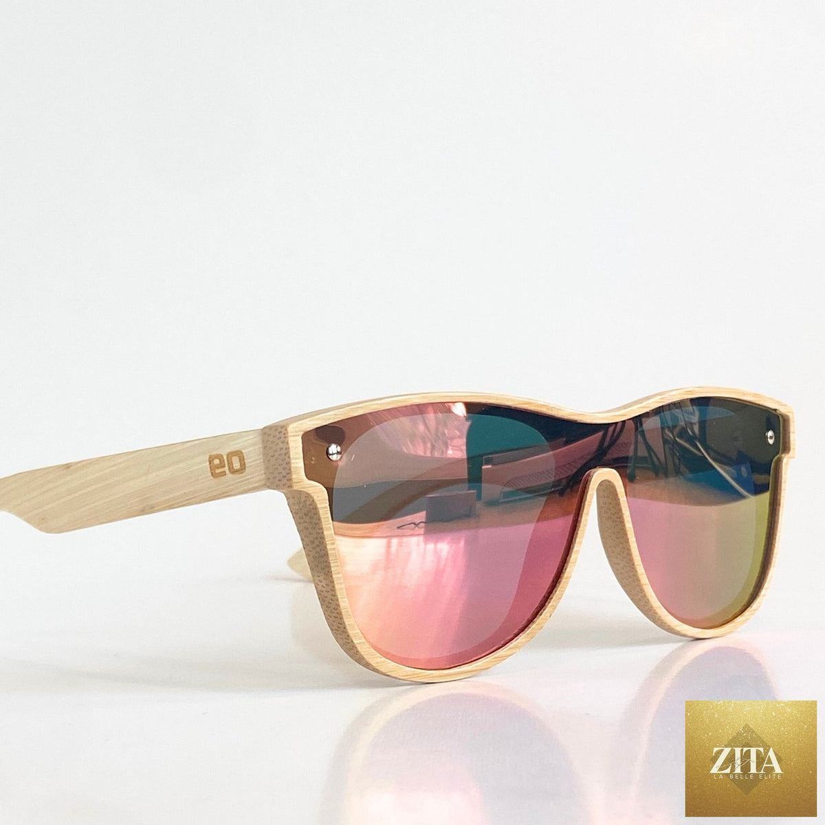 Eastern Outer Alejandra sunglasses in original bamboo with round frames and tinted lenses, showcasing eco-friendly style.