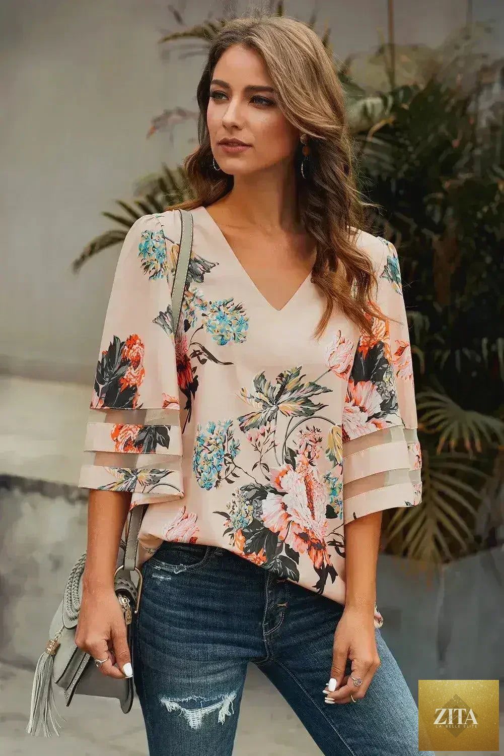 Apricot floral chiffon blouse with 3/4 flared sleeves, lightweight and stylish Femstylo top for a chic, breathable look.