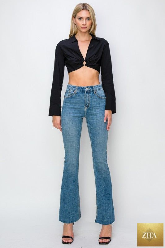 Artemis Vintage high rise flare jeans with paisley pattern, available in regular and plus sizes, styled with a casual top.