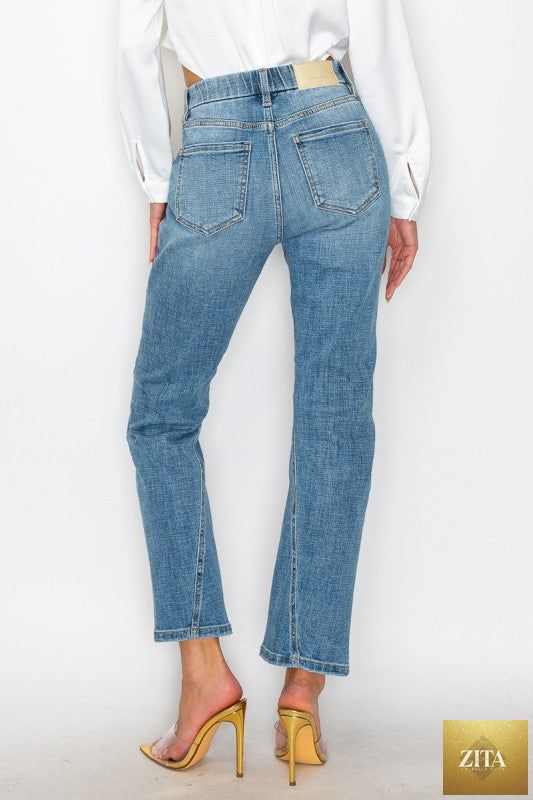 Plus tummy control high-rise straight jeans by Artemis Vintage, shown in classic denim with a flattering fit and clean front design.