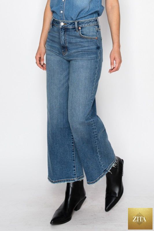 Ultra high rise crop wide jeans by Artemis Vintage, featuring a light wash denim with distressed details and wide-leg fit.