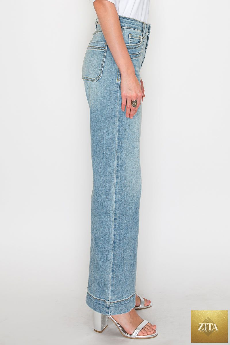 High-rise Artemis Vintage jeans with tummy control and wide-leg fit, showcasing classic denim style and comfortable waist design.