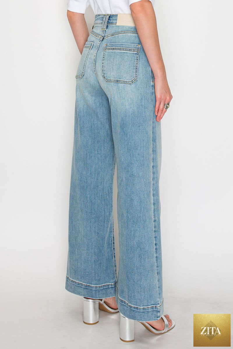 High-rise Artemis Vintage jeans with tummy control and wide-leg fit, featuring classic denim fabric and stylish stitching.