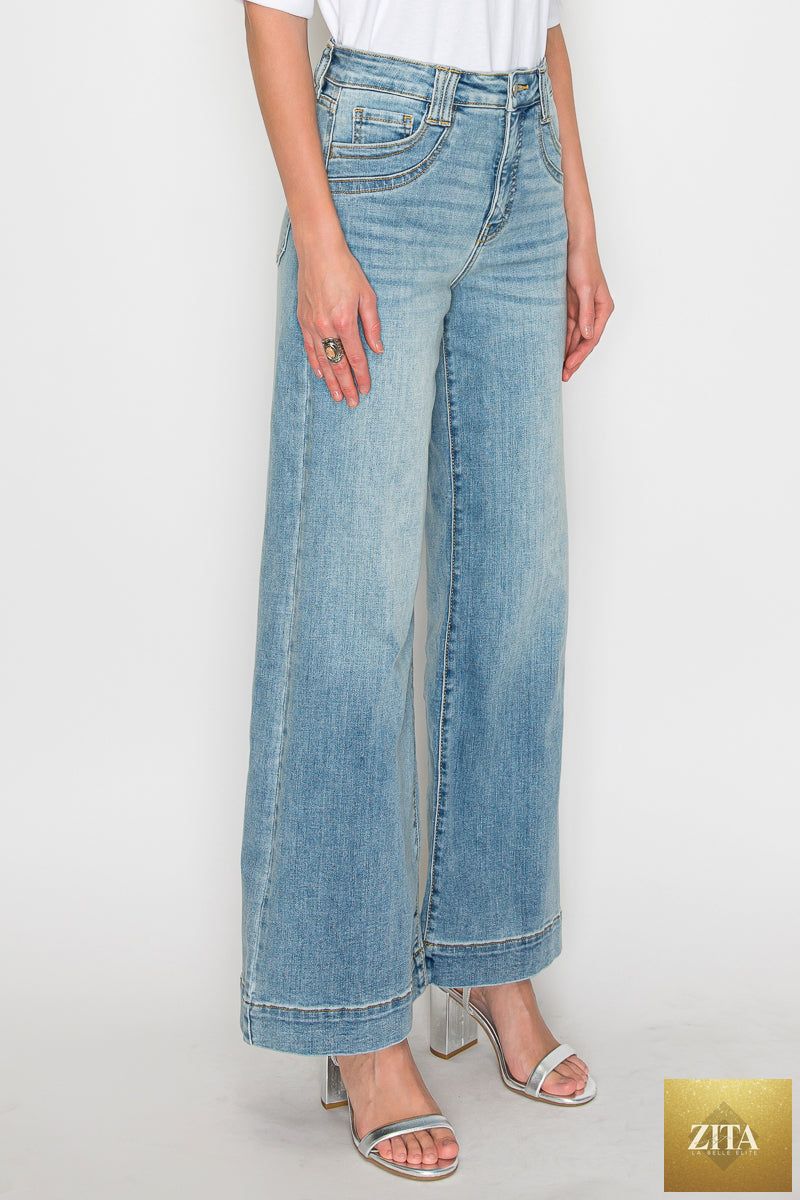 Artemis Vintage high-rise tummy control jeans with wide-leg fit, showcasing dark denim fabric and classic five-pocket design.