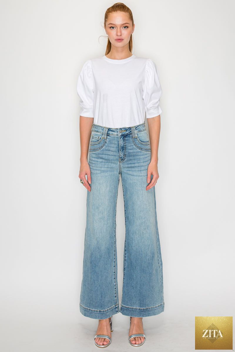 Artemis Vintage high-rise jeans with tummy control and wide-leg fit, showcasing classic denim style and comfortable stretch.