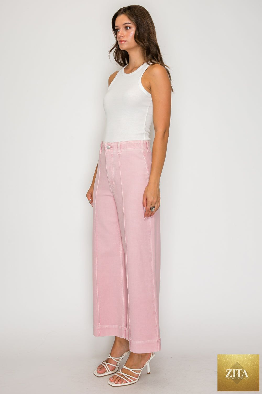 Pair of Artemis Vintage large jeans with tummy control, featuring ultra-high waist and wide fit, shown in a natural denim look.