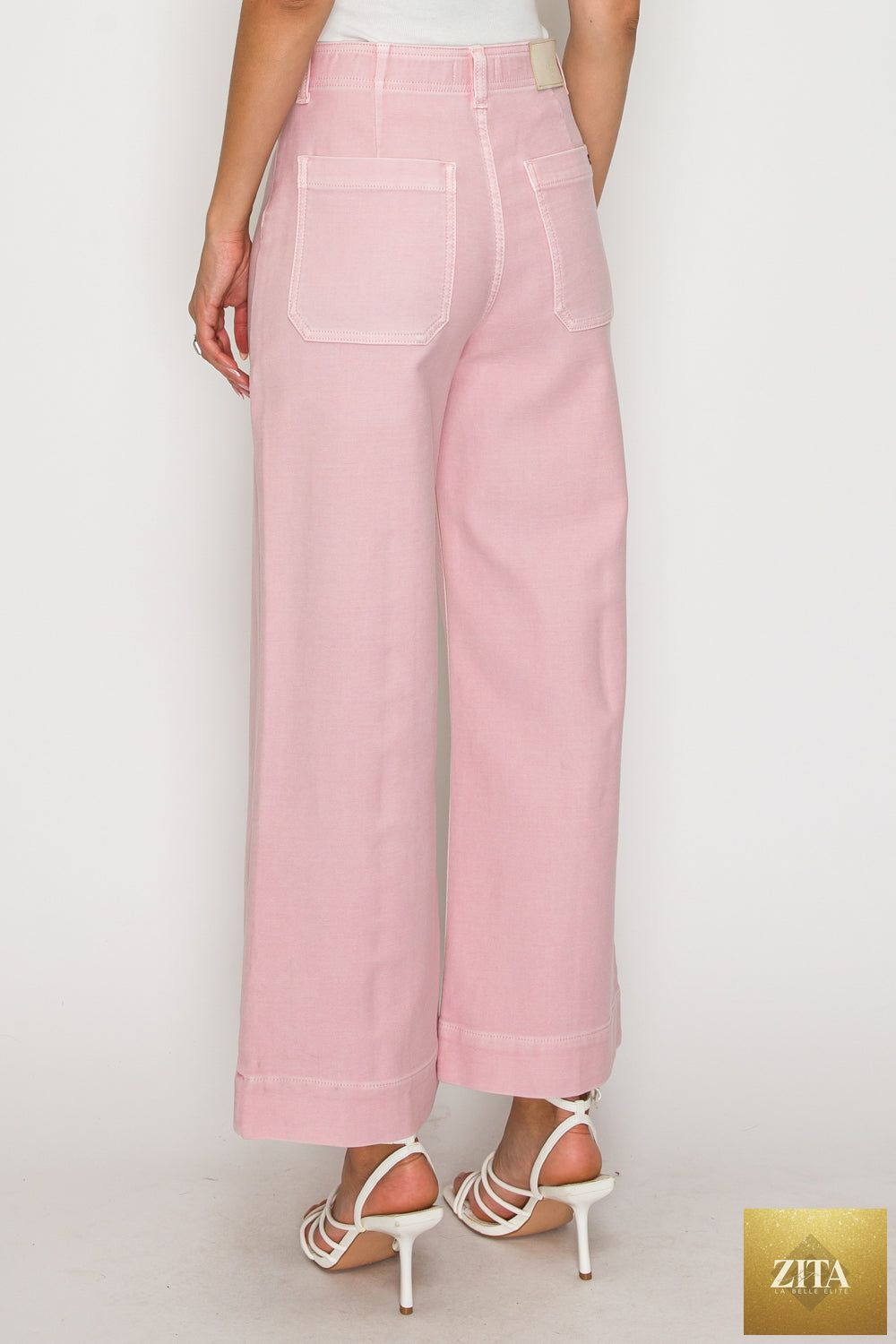 Pair of Artemis Vintage large jeans featuring tummy control, ultra high waist, and wide fit, displayed on a neutral background.