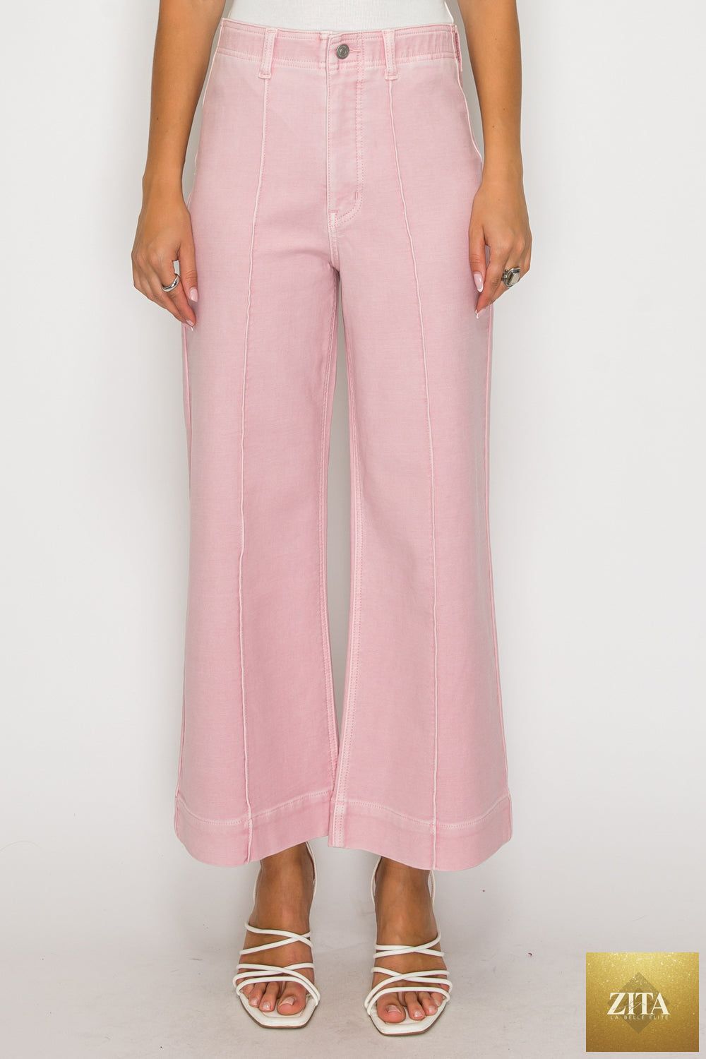 High-waisted Artemis Vintage jeans with tummy control and wide fit, showcasing a large denim style with a classic blue wash.